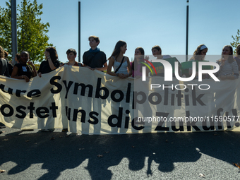 Protesters march during the global climate strike organized by Fridays for Future in Berlin, Germany, on September 20, 2024 (