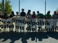 Protesters march during the global climate strike organized by Fridays for Future in Berlin, Germany, on September 20, 2024 (