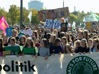 Protesters march during the global climate strike organized by Fridays for Future in Berlin, Germany, on September 20, 2024 (