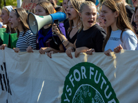 Protesters march during the global climate strike organized by Fridays for Future in Berlin, Germany, on September 20, 2024 (