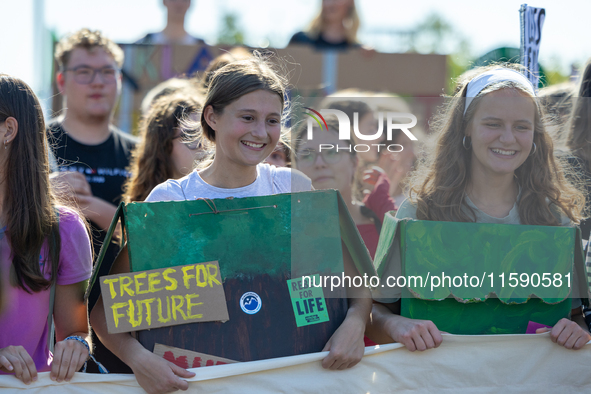 Protesters march during the global climate strike organized by Fridays for Future in Berlin, Germany, on September 20, 2024 