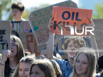 Protesters march during the global climate strike organized by Fridays for Future in Berlin, Germany, on September 20, 2024 (