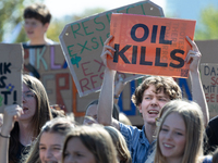 Protesters march during the global climate strike organized by Fridays for Future in Berlin, Germany, on September 20, 2024 (