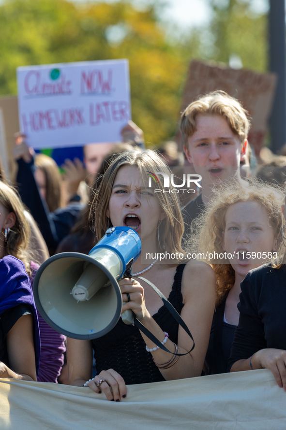 Protesters march during the global climate strike organized by Fridays for Future in Berlin, Germany, on September 20, 2024 