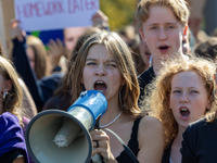 Protesters march during the global climate strike organized by Fridays for Future in Berlin, Germany, on September 20, 2024 (