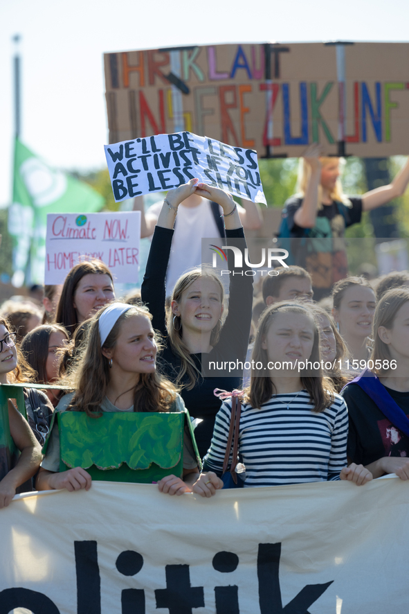 Protesters march during the global climate strike organized by Fridays for Future in Berlin, Germany, on September 20, 2024 