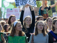 Protesters march during the global climate strike organized by Fridays for Future in Berlin, Germany, on September 20, 2024 (