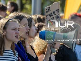 Protesters march during the global climate strike organized by Fridays for Future in Berlin, Germany, on September 20, 2024 (