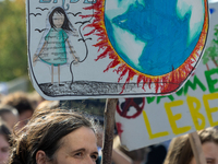 Protesters march during the global climate strike organized by Fridays for Future in Berlin, Germany, on September 20, 2024 (