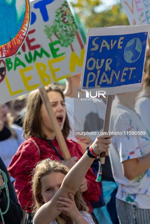 Protesters march during the global climate strike organized by Fridays for Future in Berlin, Germany, on September 20, 2024 