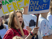 Protesters march during the global climate strike organized by Fridays for Future in Berlin, Germany, on September 20, 2024 (