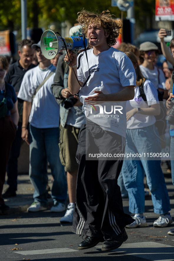 Protesters march during the global climate strike organized by Fridays for Future in Berlin, Germany, on September 20, 2024 