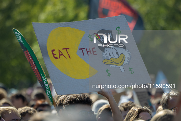 Protesters march during the global climate strike organized by Fridays for Future in Berlin, Germany, on September 20, 2024 