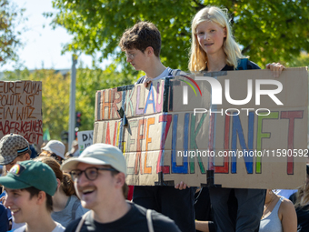 Protesters march during the global climate strike organized by Fridays for Future in Berlin, Germany, on September 20, 2024 (