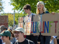 Protesters march during the global climate strike organized by Fridays for Future in Berlin, Germany, on September 20, 2024 (