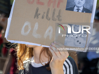 Protesters march during the global climate strike organized by Fridays for Future in Berlin, Germany, on September 20, 2024 (