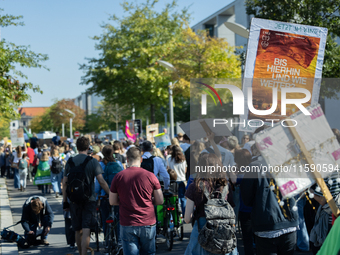 Protesters march during the global climate strike organized by Fridays for Future in Berlin, Germany, on September 20, 2024 (