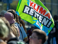 Protesters march during the global climate strike organized by Fridays for Future in Berlin, Germany, on September 20, 2024 (