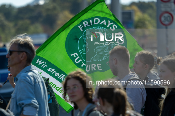 Protesters march during the global climate strike organized by Fridays for Future in Berlin, Germany, on September 20, 2024 