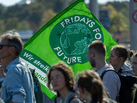 Protesters march during the global climate strike organized by Fridays for Future in Berlin, Germany, on September 20, 2024 (