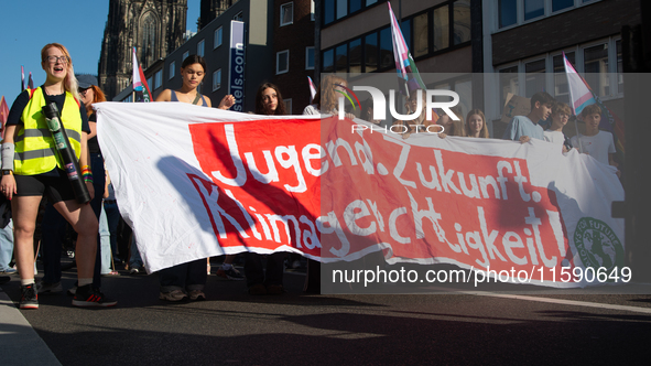 Thousands of people take part in a climate demonstration as part of the Fridays for Future climate action movement in Cologne, Germany, on S...