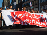 Thousands of people take part in a climate demonstration as part of the Fridays for Future climate action movement in Cologne, Germany, on S...