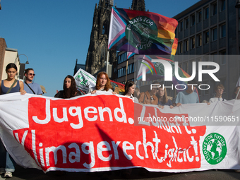 Thousands of people take part in a climate demonstration as part of the Fridays for Future climate action movement in Cologne, Germany, on S...