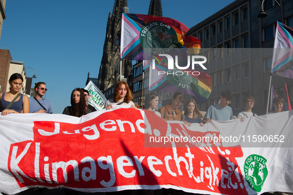 Thousands of people take part in a climate demonstration as part of the Fridays for Future climate action movement in Cologne, Germany, on S...