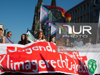 Thousands of people take part in a climate demonstration as part of the Fridays for Future climate action movement in Cologne, Germany, on S...