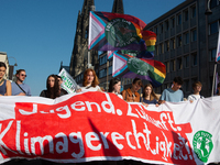 Thousands of people take part in a climate demonstration as part of the Fridays for Future climate action movement in Cologne, Germany, on S...