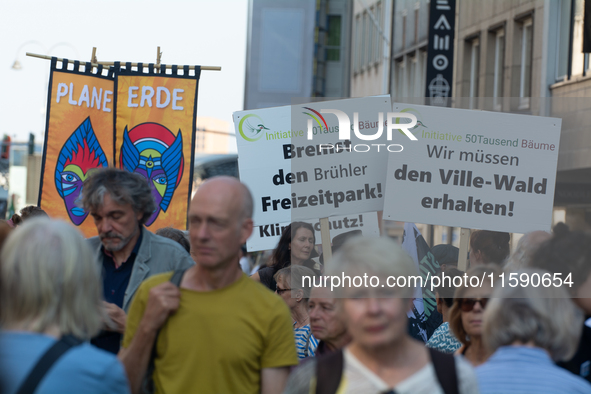 Thousands of people take part in a climate demonstration as part of the Fridays for Future climate action movement in Cologne, Germany, on S...