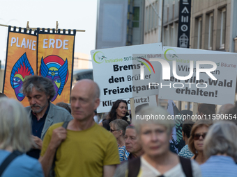 Thousands of people take part in a climate demonstration as part of the Fridays for Future climate action movement in Cologne, Germany, on S...