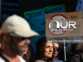 Thousands of people take part in a climate demonstration as part of the Fridays for Future climate action movement in Cologne, Germany, on S...