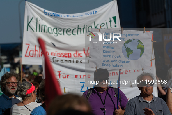 Thousands of people take part in a climate demonstration as part of the Fridays for Future climate action movement in Cologne, Germany, on S...