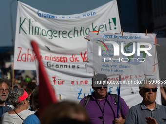 Thousands of people take part in a climate demonstration as part of the Fridays for Future climate action movement in Cologne, Germany, on S...