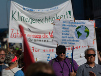 Thousands of people take part in a climate demonstration as part of the Fridays for Future climate action movement in Cologne, Germany, on S...