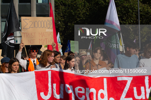 Thousands of people take part in a climate demonstration as part of the Fridays for Future climate action movement in Cologne, Germany, on S...