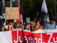 Thousands of people take part in a climate demonstration as part of the Fridays for Future climate action movement in Cologne, Germany, on S...