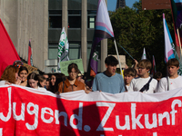 Thousands of people take part in a climate demonstration as part of the Fridays for Future climate action movement in Cologne, Germany, on S...