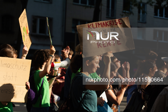 Thousands of people take part in a climate demonstration as part of the Fridays for Future climate action movement in Cologne, Germany, on S...