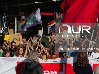 Thousands of people take part in a climate demonstration as part of the Fridays for Future climate action movement in Cologne, Germany, on S...