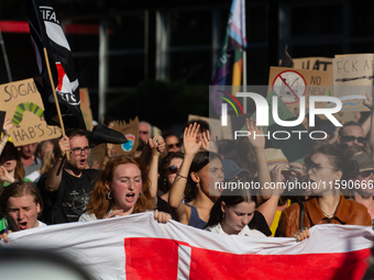 Thousands of people take part in a climate demonstration as part of the Fridays for Future climate action movement in Cologne, Germany, on S...