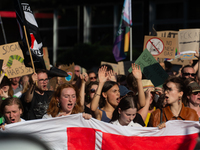 Thousands of people take part in a climate demonstration as part of the Fridays for Future climate action movement in Cologne, Germany, on S...