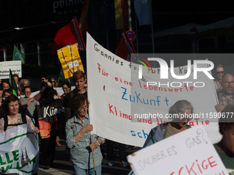 Thousands of people take part in a climate demonstration as part of the Fridays for Future climate action movement in Cologne, Germany, on S...