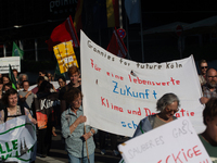 Thousands of people take part in a climate demonstration as part of the Fridays for Future climate action movement in Cologne, Germany, on S...