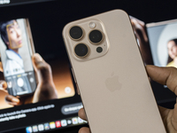 People arrive at an Apple premium reseller store as the iPhone 16 series starts selling in Guwahati, India, on September 20, 2024. (