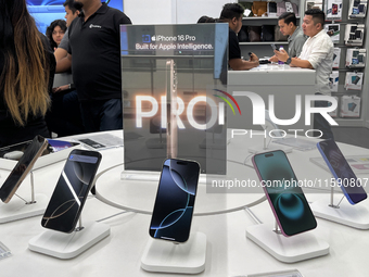 People arrive at an Apple premium reseller store as the iPhone 16 series starts selling in Guwahati, India, on September 20, 2024. (