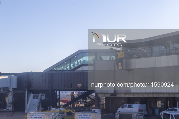 Passengers are seen through the tunnel at Orly Airport in Paris, France, on September 15, 2024. Airports Council International (ACI) World r...