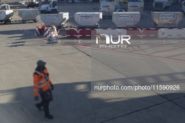 An airport worker stands on land at Orly Airport in Paris, France, on September 15, 2024. Airports Council International (ACI) World release...