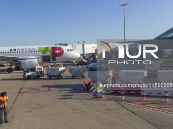 Airport workers are on land at Orly Airport in Paris, France, on September 15, 2024. Airports Council International (ACI) World releases its...